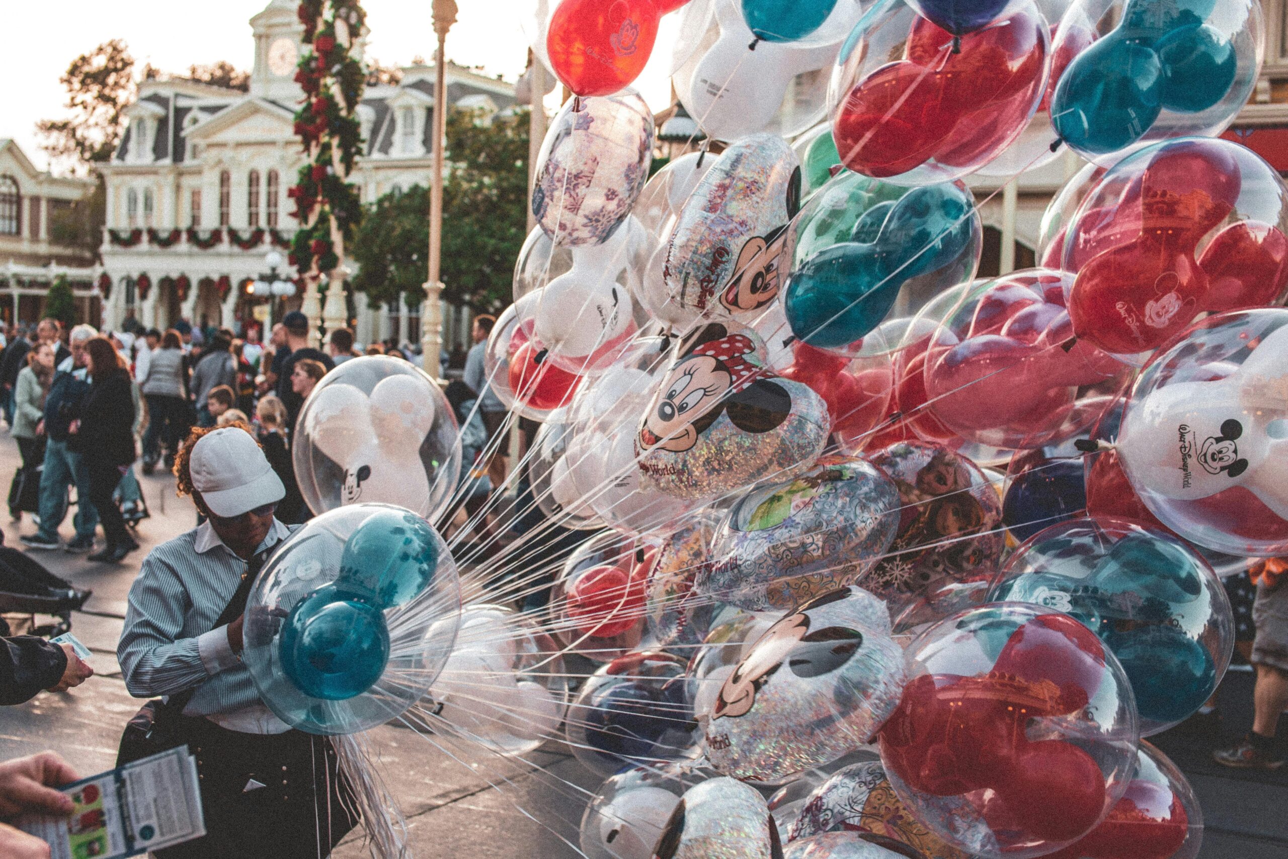 Photo of Person Holding Balloons